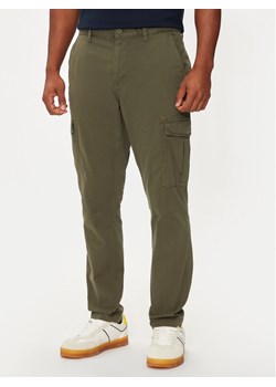 Tommy Jeans Spodnie materiałowe Austin DM0DM20750 Zielony Slim Fit ze sklepu MODIVO w kategorii Spodnie męskie - zdjęcie 182601028