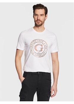 Guess T-Shirt Round Logo M3GI11 J1314 Biały Slim Fit ze sklepu MODIVO w kategorii T-shirty męskie - zdjęcie 182601058