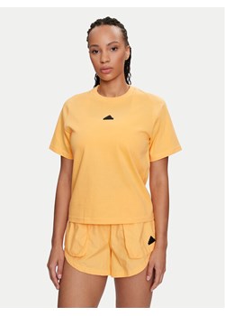 adidas T-Shirt Z.N.E. IS3932 Żółty Regular Fit ze sklepu MODIVO w kategorii Bluzki damskie - zdjęcie 182601488