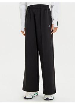 Lacoste Spodnie dresowe XF7374 Czarny Wide Leg ze sklepu MODIVO w kategorii Spodnie damskie - zdjęcie 182602646