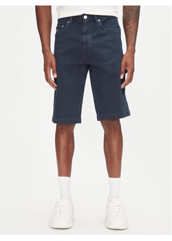 Tommy Jeans Szorty materiałowe Jaimie DM0DM21951 Granatowy Slim Fit ze sklepu MODIVO w kategorii Spodenki męskie - zdjęcie 182602946