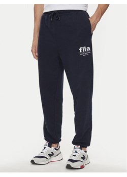 Fila Spodnie dresowe FAM0647 Granatowy Regular Fit ze sklepu MODIVO w kategorii Spodnie męskie - zdjęcie 182606637