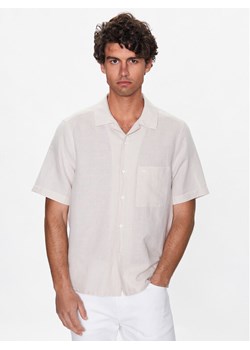 Calvin Klein Koszula K10K109521 Beżowy Regular Fit ze sklepu MODIVO w kategorii Koszule męskie - zdjęcie 182607479