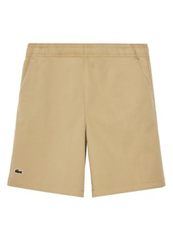Lacoste Szorty sportowe FJ5242 Beżowy Regular Fit ze sklepu MODIVO w kategorii Spodenki chłopięce - zdjęcie 182607639