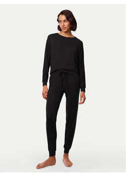 Triumph Spodnie piżamowe Cozy Comfort 10216531 Czarny Regular Fit ze sklepu MODIVO w kategorii Piżamy damskie - zdjęcie 182608768