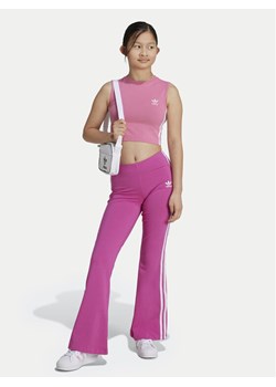 adidas Legginsy adicolor IY9784 Różowy Slim Fit ze sklepu MODIVO w kategorii Spodnie dziewczęce - zdjęcie 182609188