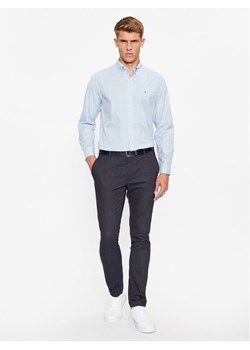 Tommy Hilfiger Koszula Core Flex MW0MW25035 Błękitny Regular Fit ze sklepu MODIVO w kategorii Koszule męskie - zdjęcie 182610045