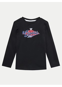 Guess Bluzka L4BI15 I3Z14 Czarny Regular Fit ze sklepu MODIVO w kategorii T-shirty chłopięce - zdjęcie 182611487