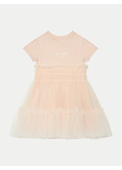 Guess Sukienka elegancka K5RK14 K6YW0 Koralowy Regular Fit ze sklepu MODIVO w kategorii Sukienki dziewczęce - zdjęcie 182612587