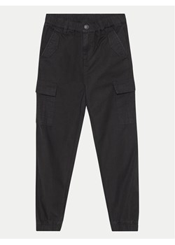 Guess Spodnie materiałowe L4YB00 WGBT0 Czarny Regular Fit ze sklepu MODIVO w kategorii Spodnie dziewczęce - zdjęcie 182612995