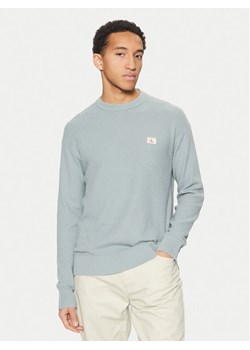 Calvin Klein Jeans Sweter J30J326746 Niebieski Relaxed Fit ze sklepu MODIVO w kategorii Swetry męskie - zdjęcie 182613007