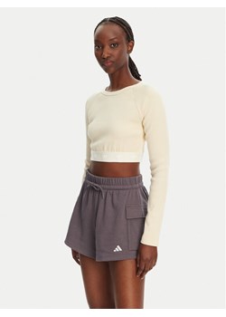 adidas Bluzka Ribbed JD0013 Beżowy Slim Fit ze sklepu MODIVO w kategorii Bluzki damskie - zdjęcie 182613067