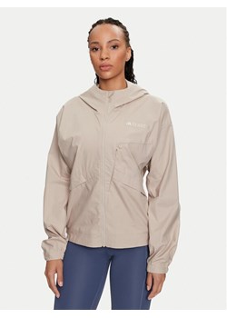 adidas Wiatrówka Terrex Xploric IK9114 Beżowy Loose Fit ze sklepu MODIVO w kategorii Kurtki damskie - zdjęcie 182613266