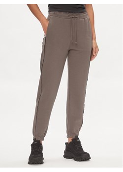 Outhorn Spodnie dresowe OTHAW23TTROF478 Szary Regular Fit ze sklepu MODIVO w kategorii Spodnie damskie - zdjęcie 182613479