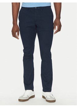 Michael Kors Chinosy CS4301KDR2 Granatowy Slim Fit ze sklepu MODIVO w kategorii Spodnie męskie - zdjęcie 182613646