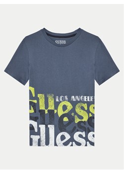 Guess T-Shirt L5RI12 K8HM4 Granatowy Regular Fit - id: 0000304576058 - marki Guess - 182615539 Guess T-Shirt L5RI12 K8HM4 Granatowy Regular Fit ze sklepu MODIVO w kategorii T-shirty chłopięce - zdjęcie 182615539