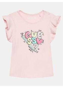Guess T-Shirt A4GI02 K6YW4 Różowy Regular Fit ze sklepu MODIVO w kategorii Bluzki dziewczęce - zdjęcie 182616249