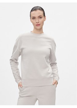 Calvin Klein Bluza Metallic Micro Logo Sweatshirt K20K206961 Beżowy Regular Fit ze sklepu MODIVO w kategorii Bluzy damskie - zdjęcie 182617446