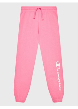 Champion Spodnie dresowe 404608 Różowy Regular Fit ze sklepu MODIVO w kategorii Spodnie dziewczęce - zdjęcie 182617477
