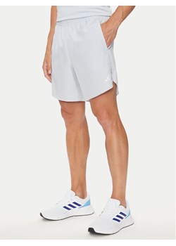 adidas Szorty sportowe Run It IN0092 Błękitny Regular Fit ze sklepu MODIVO w kategorii Spodenki męskie - zdjęcie 182617826