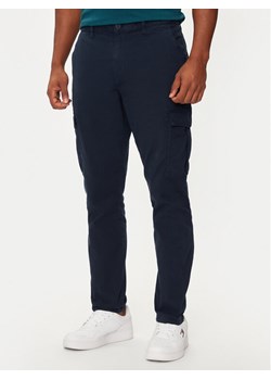 Tommy Jeans Spodnie materiałowe Austin DM0DM20750 Granatowy Slim Fit ze sklepu MODIVO w kategorii Spodnie męskie - zdjęcie 182621326