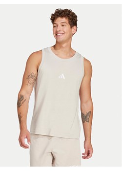 adidas Tank top Essentials Small Logo IN6177 Beżowy Regular Fit ze sklepu MODIVO w kategorii T-shirty męskie - zdjęcie 182623407