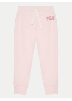 Gap Spodnie dresowe 843630-02 Różowy Regular Fit ze sklepu MODIVO w kategorii Spodnie dziewczęce - zdjęcie 182623465