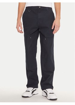 Champion Spodnie materiałowe 220506 Granatowy Straight Leg ze sklepu MODIVO w kategorii Spodnie męskie - zdjęcie 182624428