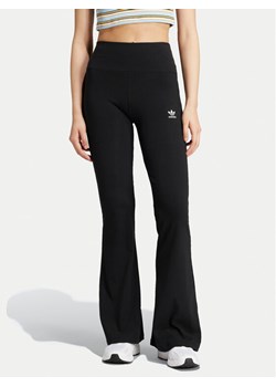 adidas Legginsy Essentials IW5727 Czarny Slim Fit ze sklepu MODIVO w kategorii Spodnie damskie - zdjęcie 182626007
