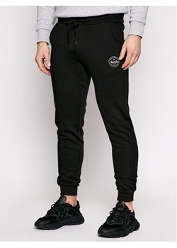 Jack&Jones Spodnie dresowe Gordon 12165322 Czarny Regular Fit ze sklepu MODIVO w kategorii Spodnie męskie - zdjęcie 182626646
