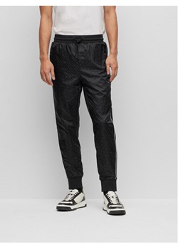 Boss Spodnie dresowe Lamont 128 50494075 Czarny Regular Fit ze sklepu MODIVO w kategorii Spodnie męskie - zdjęcie 182627906