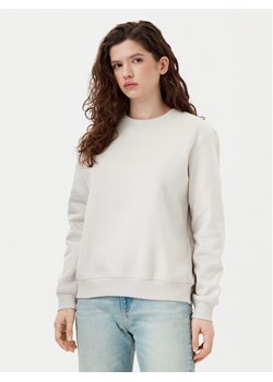 Calvin Klein Jeans Bluza Institutional Graphic J20J224731 Beżowy Regular Fit ze sklepu MODIVO w kategorii Bluzy damskie - zdjęcie 182629855