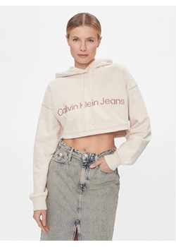 Calvin Klein Jeans Bluza Hero Monologo Short Hoodie J20J222540 Écru Regular Fit ze sklepu MODIVO w kategorii Bluzy damskie - zdjęcie 182629975
