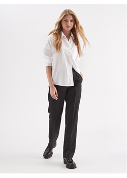 Calvin Klein Spodnie materiałowe Essential K20K206879 Czarny Slim Fit ze sklepu MODIVO w kategorii Spodnie damskie - zdjęcie 182630467