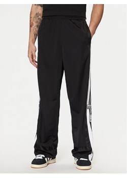 adidas Spodnie dresowe Adibreak JD4267 Czarny Loose Fit ze sklepu MODIVO w kategorii Spodnie męskie - zdjęcie 182631066