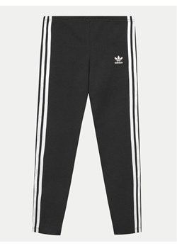 adidas Legginsy adicolor IY7475 Czarny Slim Fit ze sklepu MODIVO w kategorii Spodnie dziewczęce - zdjęcie 182631287