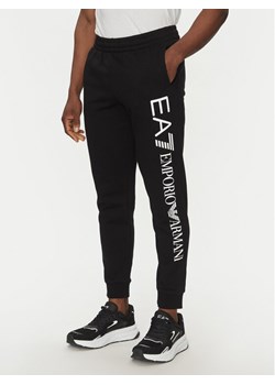 EA7 Emporio Armani Spodnie dresowe 7M000572 AF10377 MC001 Czarny Regular Fit ze sklepu MODIVO w kategorii Spodnie męskie - zdjęcie 182631367