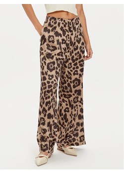 Vero Moda Spodnie materiałowe Merle 10295435 Beżowy Loose Fit ze sklepu MODIVO w kategorii Spodnie damskie - zdjęcie 182631555