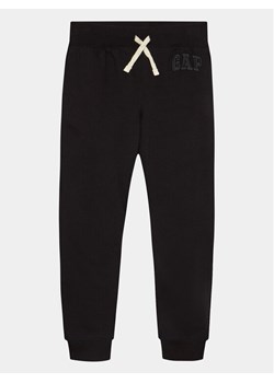Gap Spodnie dresowe 860249-00 Czarny Regular Fit ze sklepu MODIVO w kategorii Spodnie chłopięce - zdjęcie 182632028