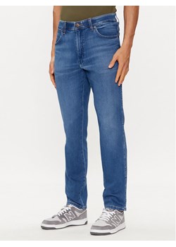 Wrangler Jeansy River 112352673 Niebieski Tapered Fit ze sklepu MODIVO w kategorii Jeansy męskie - zdjęcie 182632829