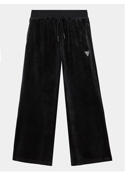Guess Spodnie dresowe J4RQ16 KBXI2 Czarny Wide Leg ze sklepu MODIVO w kategorii Spodnie dziewczęce - zdjęcie 182634219