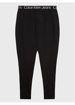 Calvin Klein Jeans Legginsy J20J220835 Czarny Slim Fit ze sklepu MODIVO w kategorii Spodnie damskie - zdjęcie 182635358