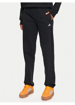 adidas Spodnie dresowe Essentials Small Logo IW0221 Czarny Regular Fit ze sklepu MODIVO w kategorii Spodnie damskie - zdjęcie 182637517