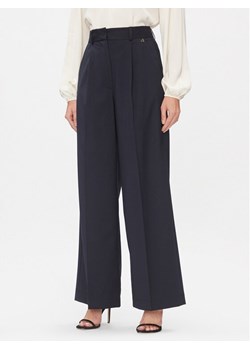 Dixie Spodnie materiałowe PCHSVCGA Granatowy Relaxed Fit ze sklepu MODIVO w kategorii Spodnie damskie - zdjęcie 182637757