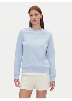 Tommy Jeans Bluza Tjw Reg S Flag Crew DW0DW19959 Błękitny Regular Fit ze sklepu MODIVO w kategorii Bluzy damskie - zdjęcie 182637868