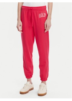 Gap Spodnie dresowe 889527-04 Różowy Relaxed Fit ze sklepu MODIVO w kategorii Spodnie damskie - zdjęcie 182638078