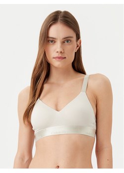 Calvin Klein Underwear Biustonosz bezfiszbinowy 000QF7993E Beżowy ze sklepu MODIVO w kategorii Biustonosze - zdjęcie 182638309