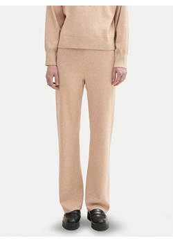 Tom Tailor Denim Spodnie dzianinowe 1043355 Beżowy Straight Fit ze sklepu MODIVO w kategorii Spodnie damskie - zdjęcie 182638955