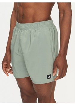 adidas Szorty kąpielowe Solid CLX JC9920 Zielony Regular Fit ze sklepu MODIVO w kategorii Kąpielówki - zdjęcie 182641428