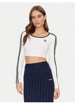 adidas Bluzka adicolor 3-Stripes JD4625 Biały Slim Fit ze sklepu MODIVO w kategorii Bluzki damskie - zdjęcie 182642207